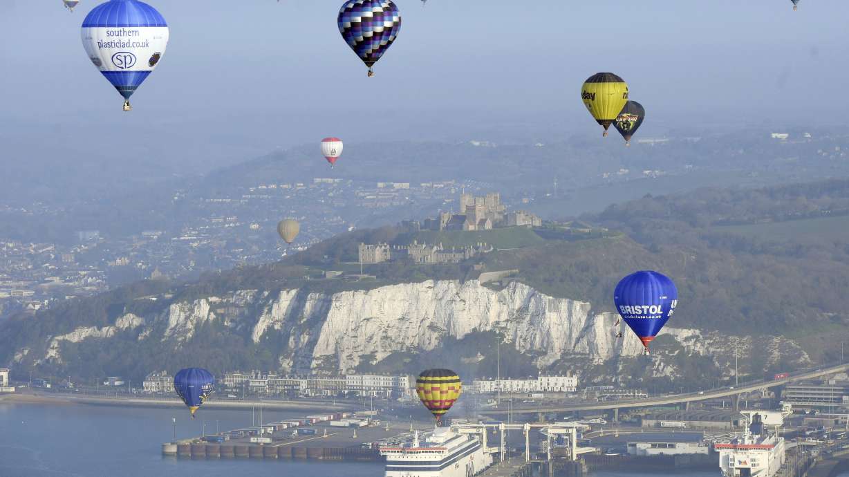 Hot-air balloons cross Channel in colorful record attempt