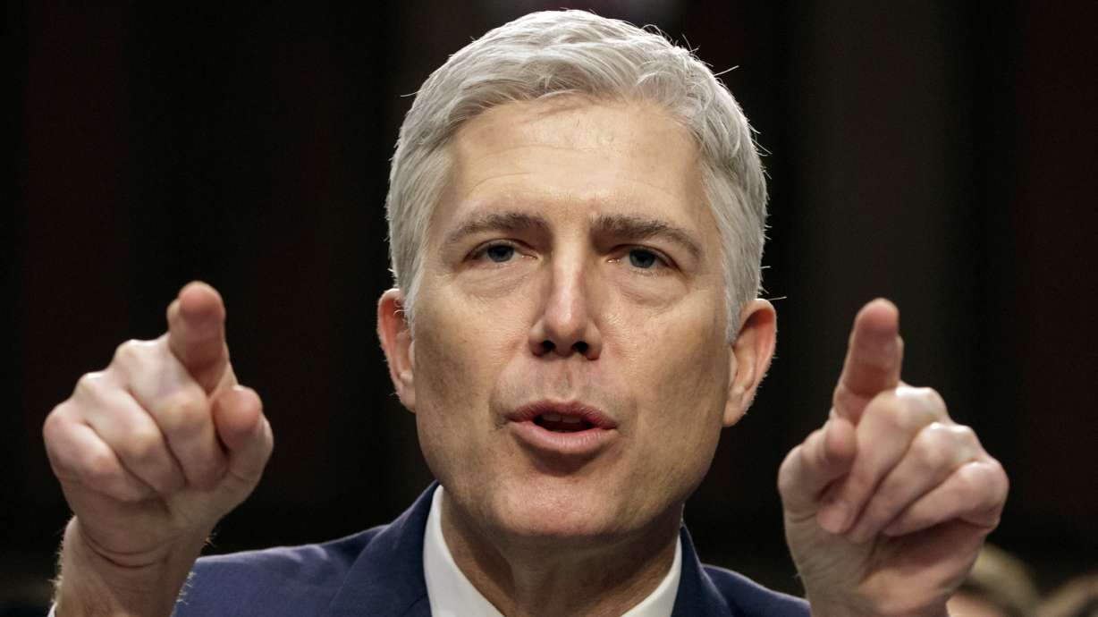 The Latest: Trump praises Gorsuch after confirmation