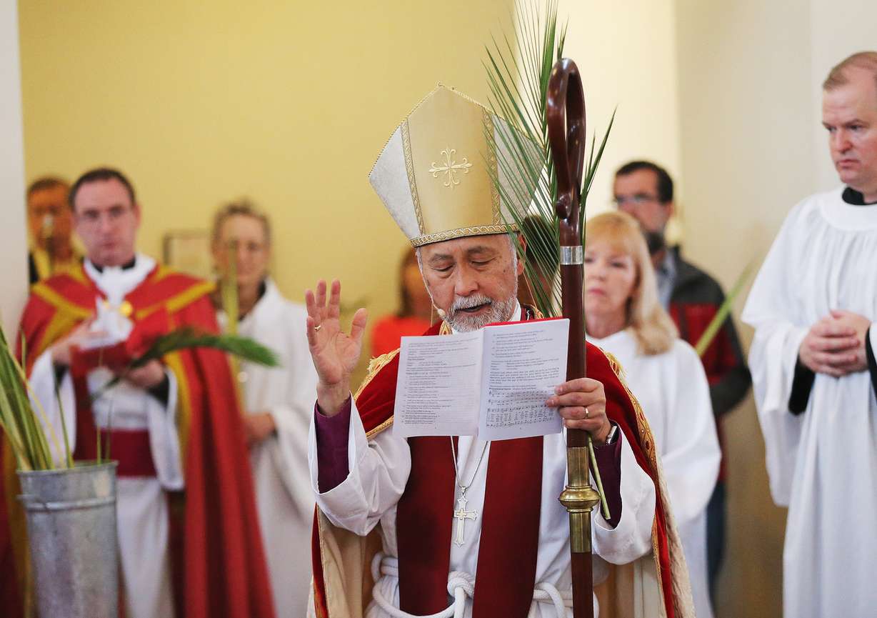 The Right Rev. Scott Hayashi blesses the palms at the Cathedral Church of St. Mark during Palm Sunday services in Salt Lake City on Sunday, April 9, 2017. (Photo: Jeffrey D. Allred, Deseret News)
