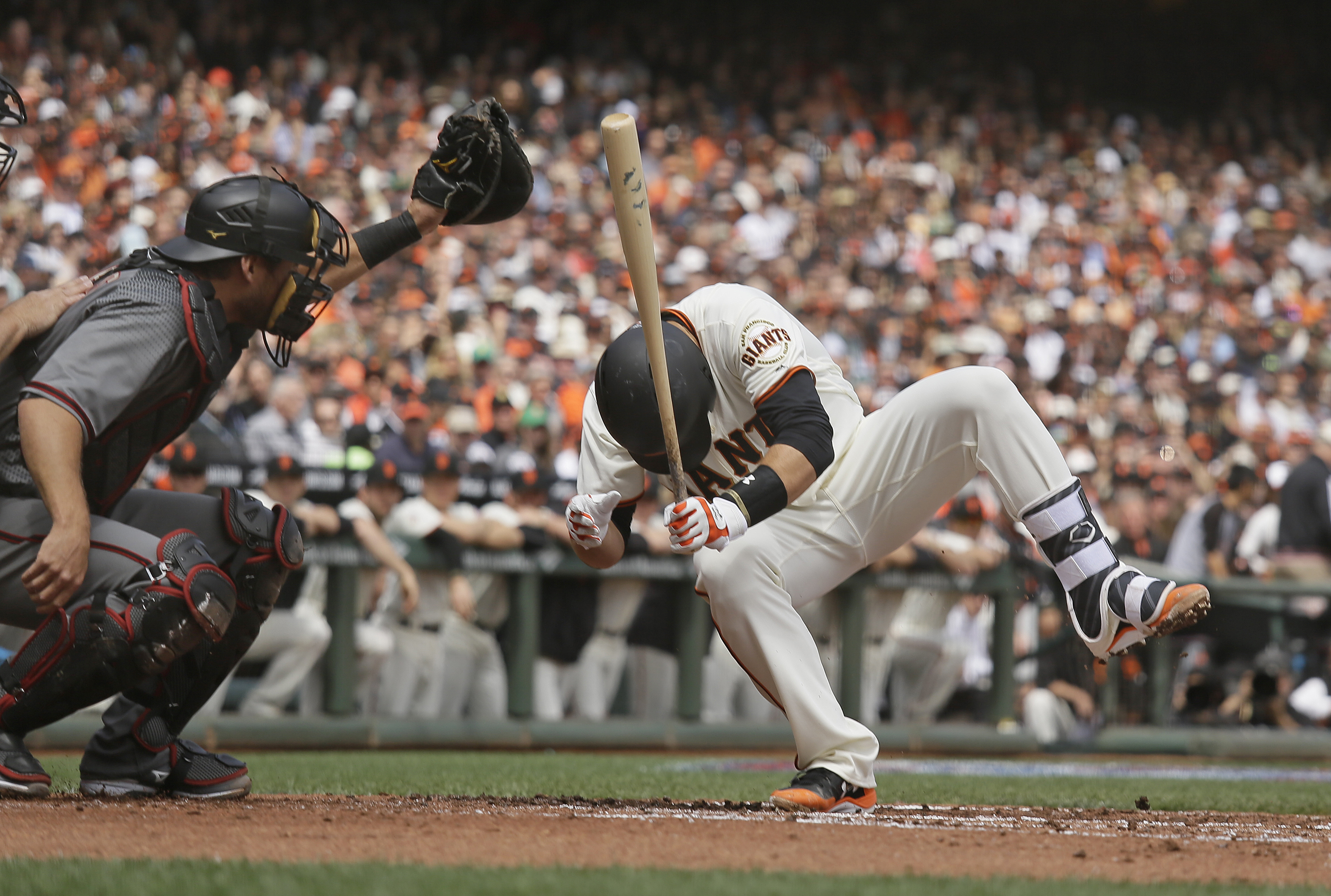 Giants' Posey 'doing fine' after hit in head by pitch
