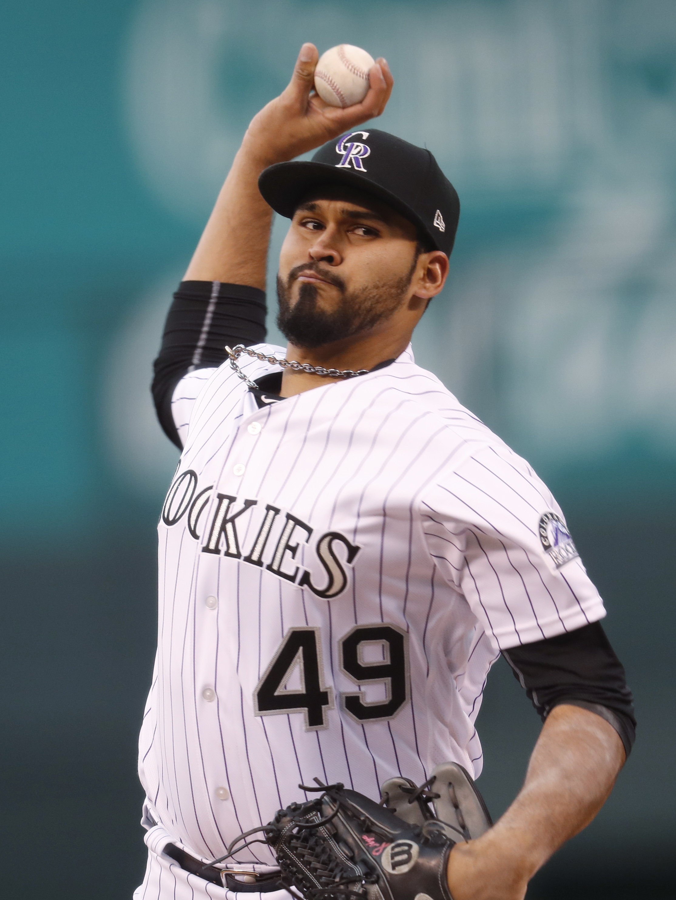 Rockies' Senzatela gets 1st win, to take ball to mom's grave