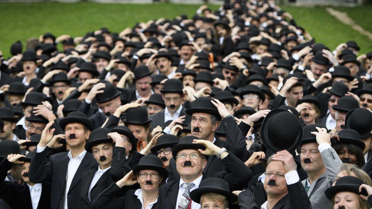 Hundreds dress up as Chaplin's 'Tramp' at star's Swiss home