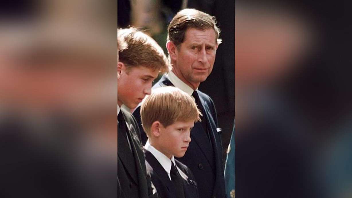 Aug. 19, 1995. Britain's Princess Diana, left, sits next to her younger son Prince Harry during V-J Day celebrations in London. (AP Photo/Alastair Grant, file)