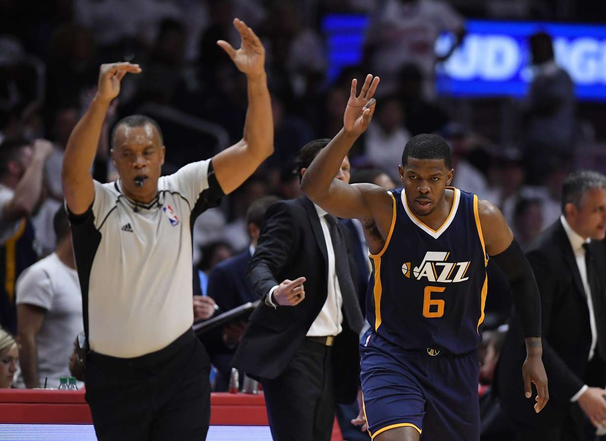 Utah Jazz forward Joe Johnson, right, gestures after hitting a three-point shot during the second half in Game 1 of an NBA basketball first-round playoff series against the Los Angeles Clippers, Saturday, April 15, 2017, in Los Angeles. The Jazz won 97-95. (Mark J. Terrill, AP Photo)