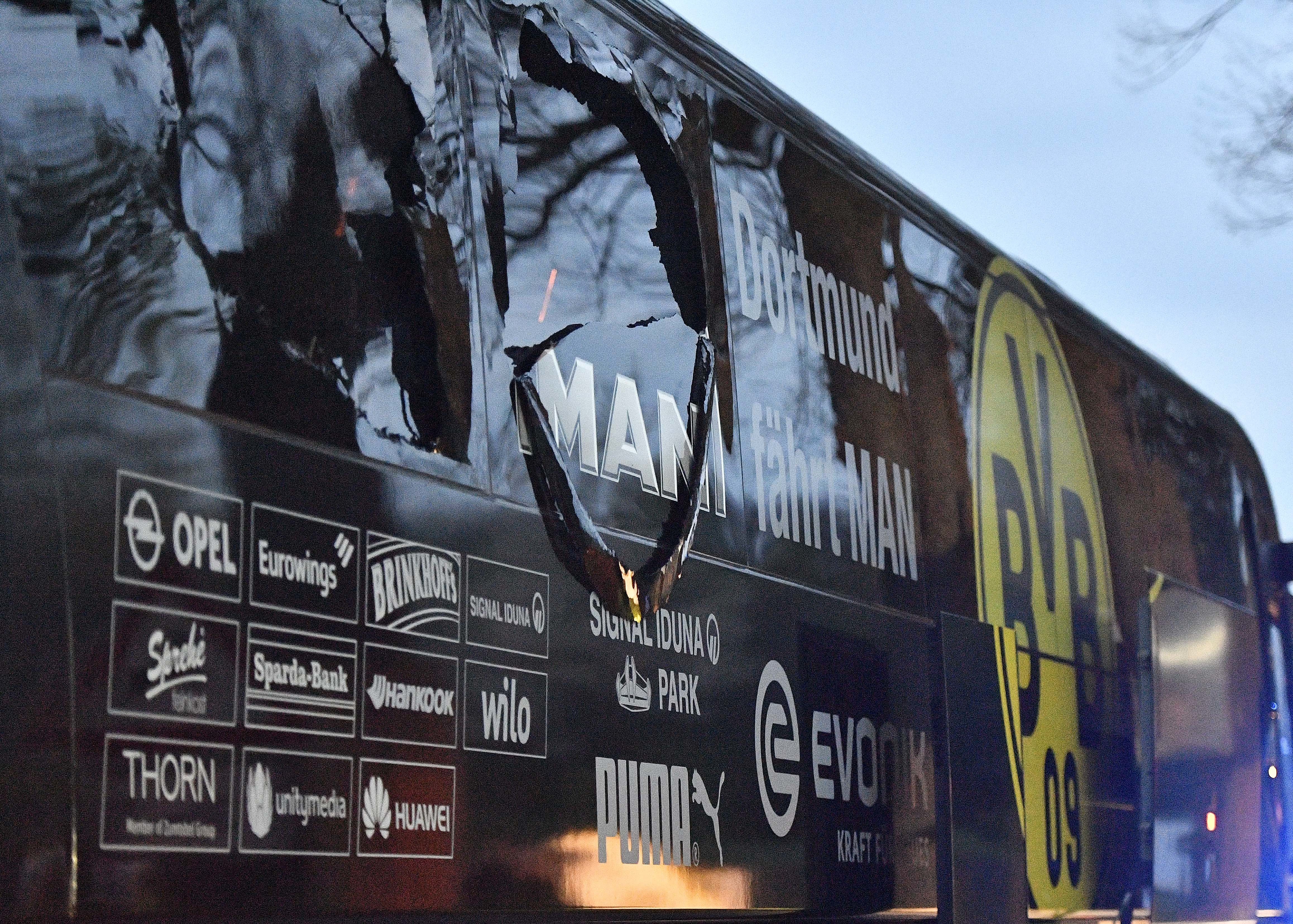 The Latest: Dortmund bus attack suspect bet against the team