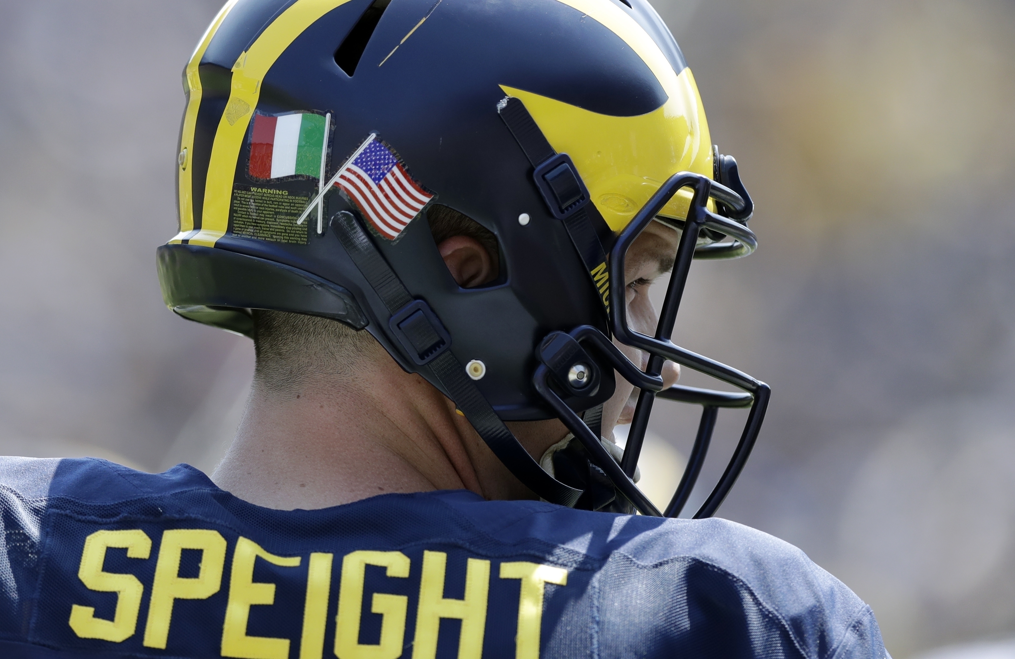 Addio! Michigan's football team heads to Italy