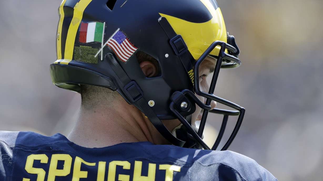 Addio! Michigan's football team heads to Italy