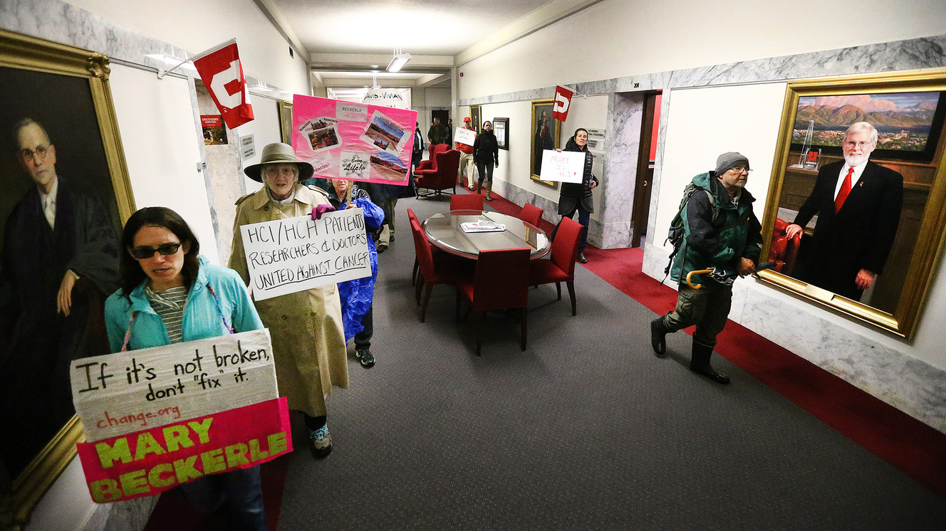 Dozens of cancer patients and others march to University of Utah President David W. Pershing's office in the Park Building on Monday, April 24, 2017. The protesters called for the reinstatement of Dr. Mary Beckerle as director and CEO of the Huntsman Cancer Institute. (Photo: Scott G Winterton, Deseret News)