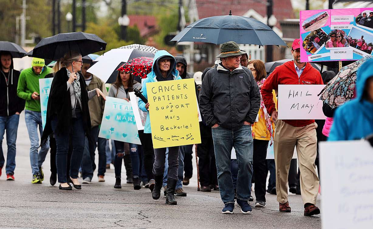 Dozens of cancer patients and others march to University of Utah President David W. Pershing's office on Monday, April 24, 2017, calling for the reinstatement of Dr. Mary Beckerle as director and CEO of the Huntsman Cancer Institute. (Photo: Scott G Winterton, Deseret News)