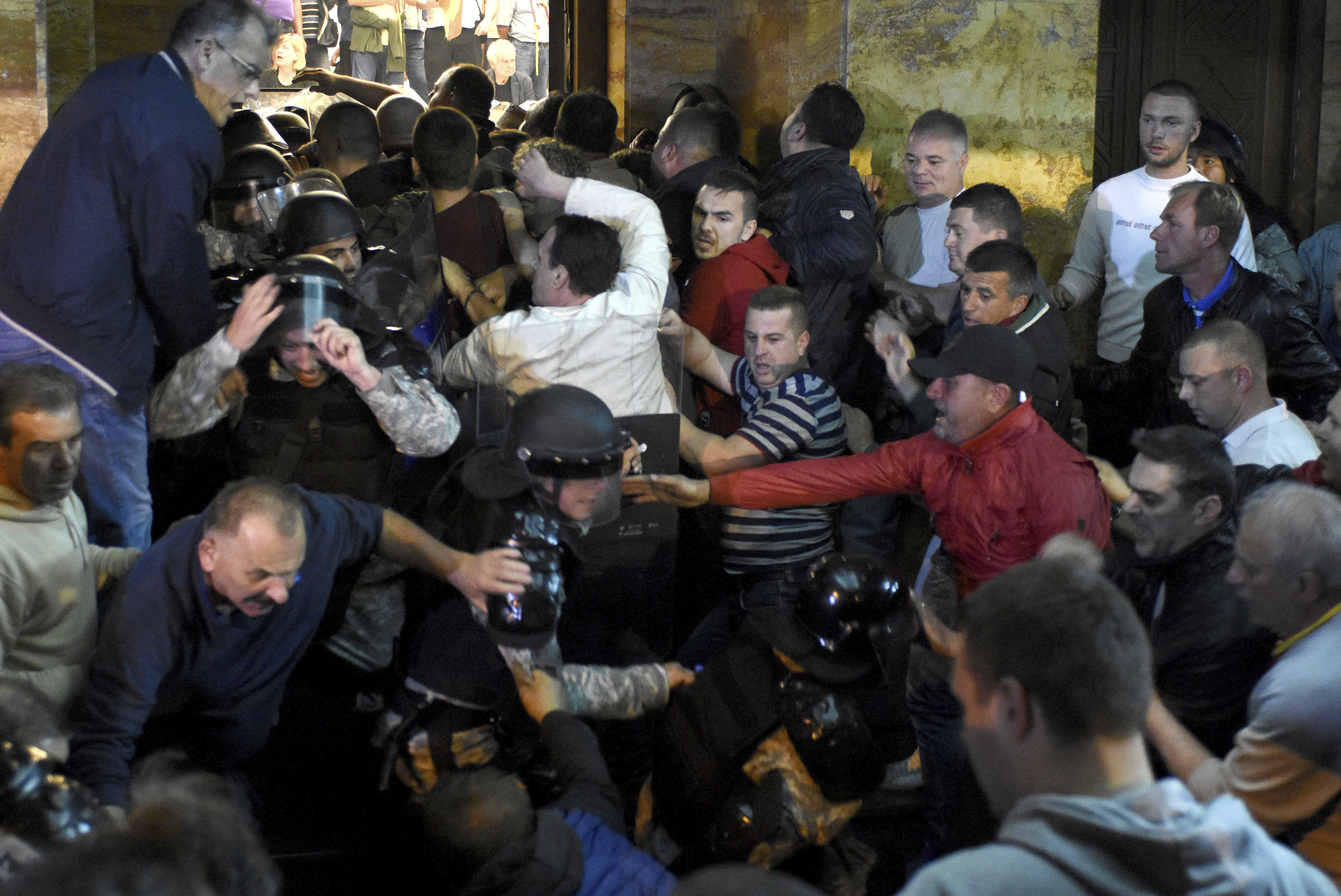 The Latest: Macedonia protesters seek new election