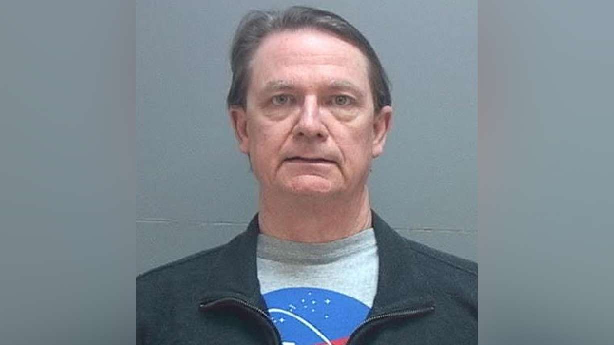 Teacher charged with bringing child-porn scrapbooks to school