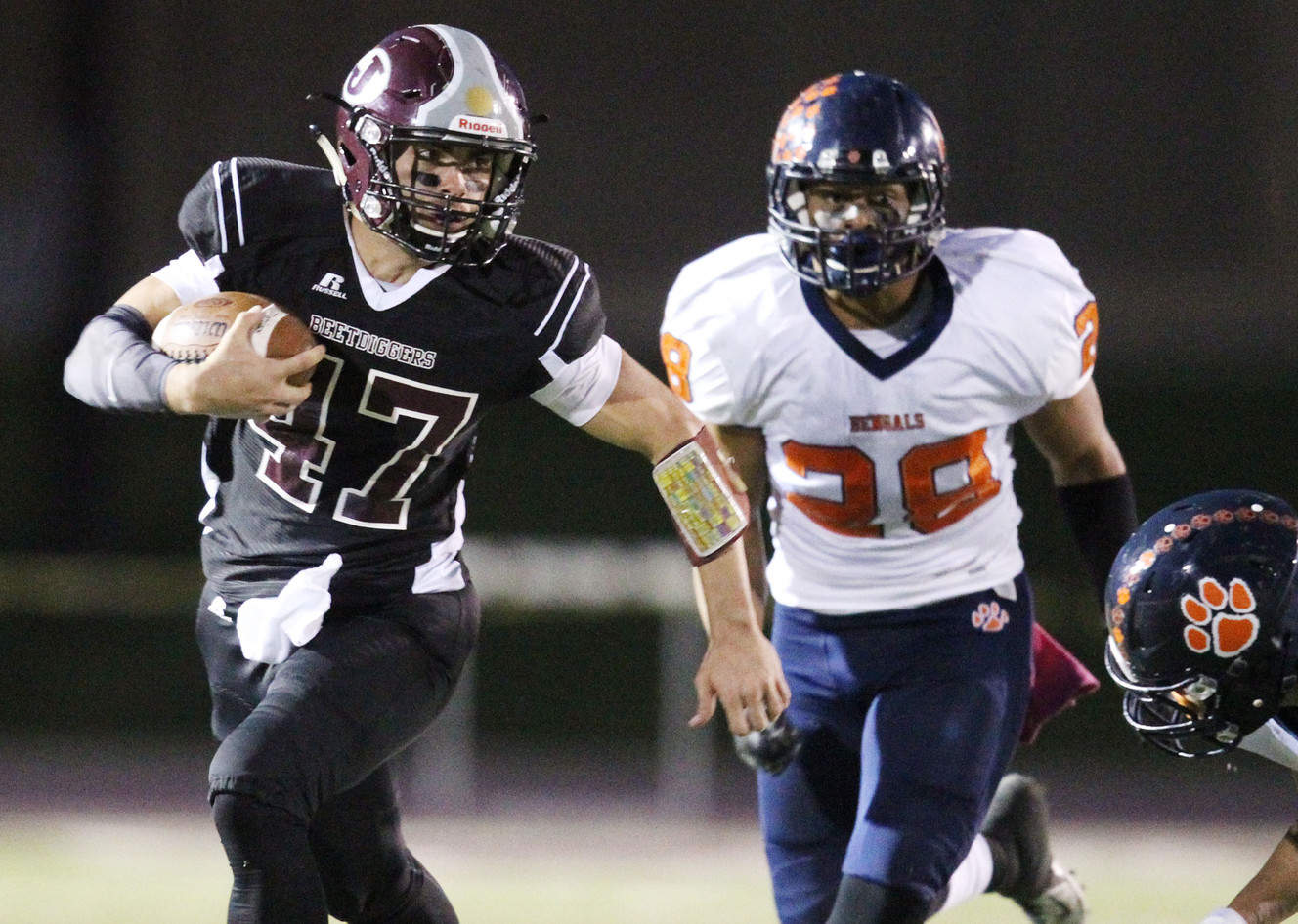 Jordan quarterback Austin Kafentzis looks for the open field as Jordan and Brighton play Oct. 15, 2014, in Sandy. (Photo: Scott G Winterton, Deseret News)