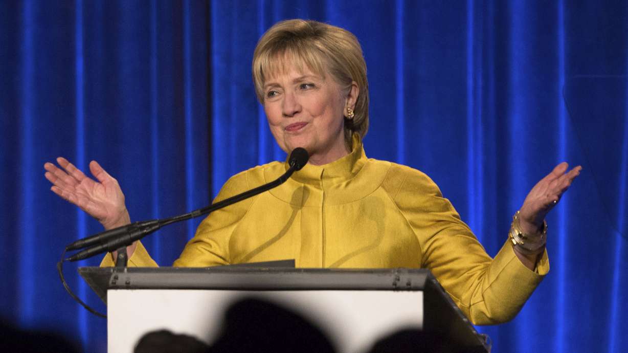 The Latest: Trump blasts Clinton in late-night tweets