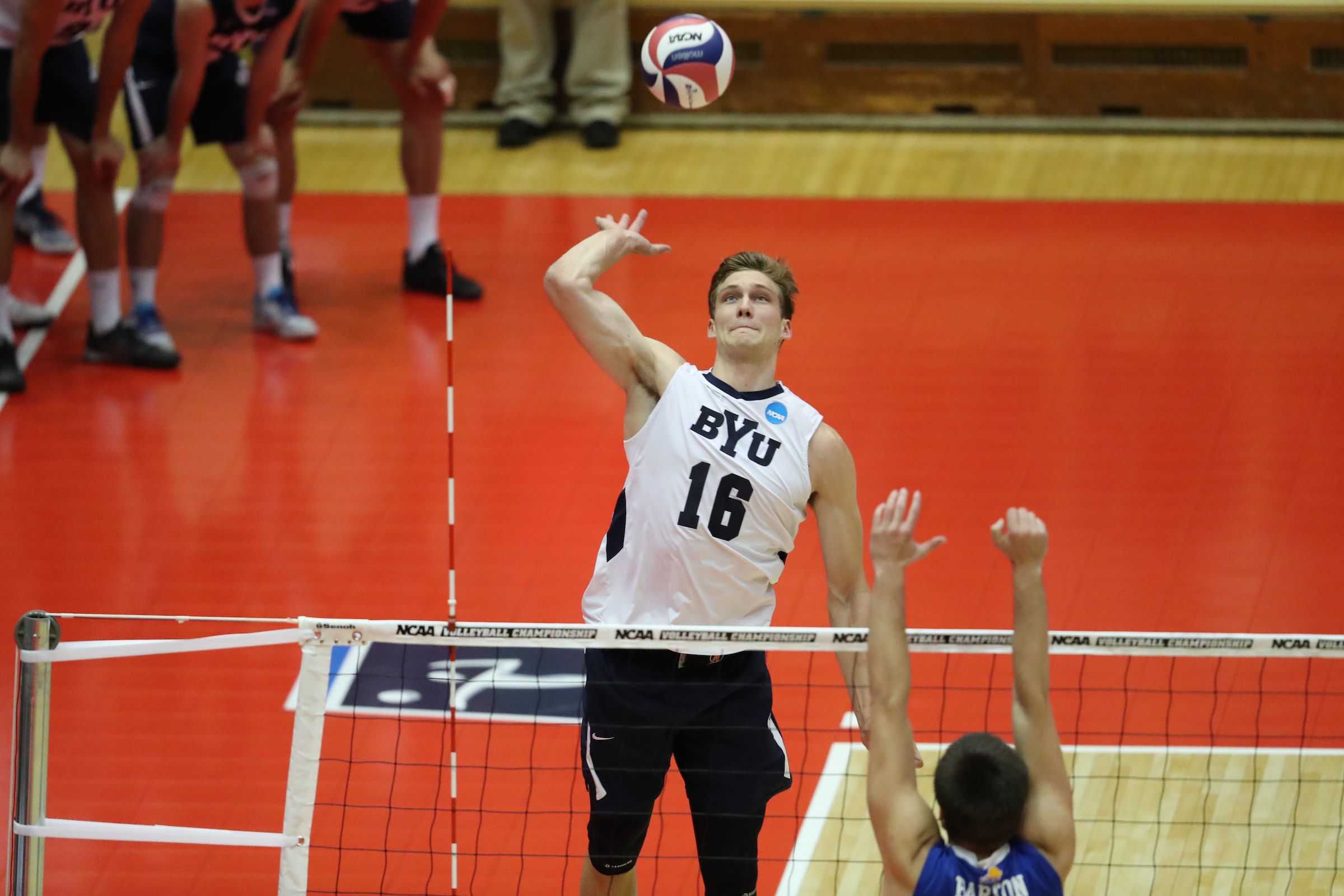 Tim Dobbert spikes a ball against Barton in the opening round of the 2017 NCAA men's volleyball tournament. (Courtesy: BYU Photo)