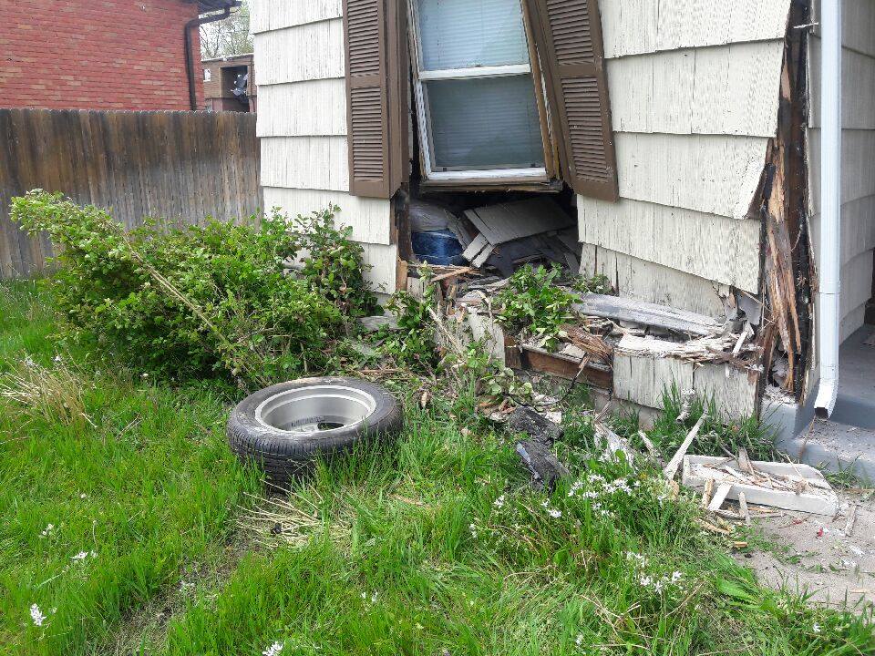 SUV crashes into Provo house during police chase