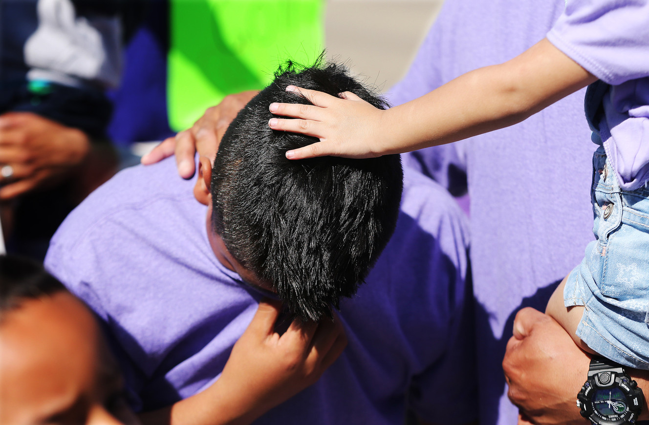 Adrian Juarez cries during a rally in support of her mother, Silvia Avelar-Flores, outside the Department of Homeland Security field office in West Valley City on Wednesday, May 3, 2017. Avelar-Flores was detained by Immigration and Customs Enforcement agents on April 28. The rally was sponsored by Mormon Women for Ethical Government, Salt Lake Indivisible and other concerned citizens. (Photo: Jeffrey D. Allred, Deseret News)
