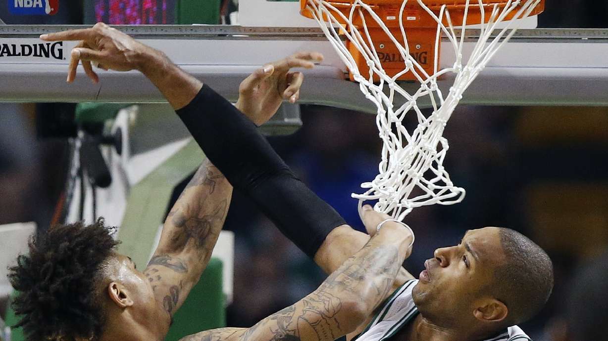 Wizards forward Oubre ejected for bowling over Olynyk