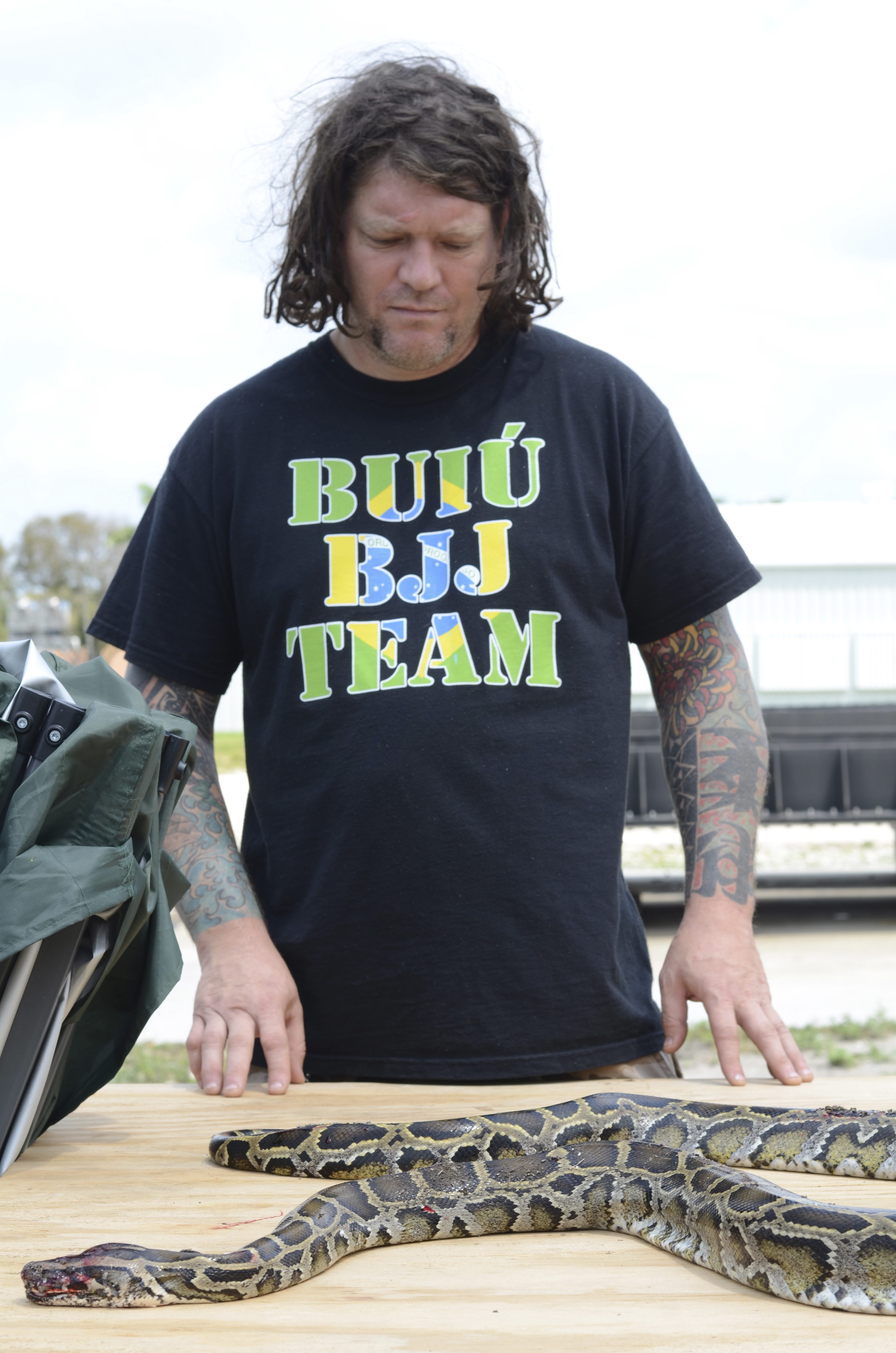 Snake fan hunts pythons in Florida to save other critters