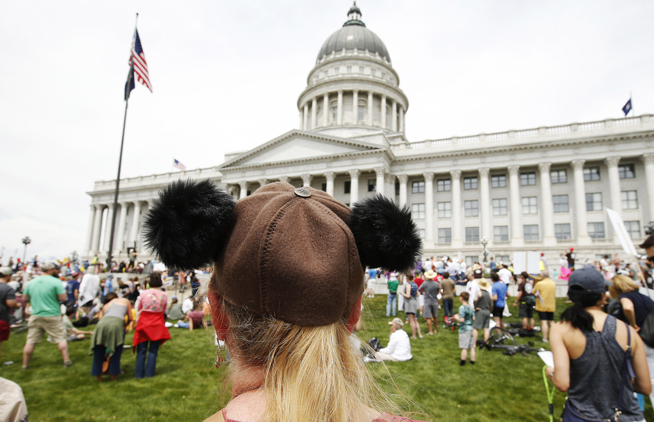 An attendee wears a bear hat during a rally in favor of the Bears Ears and Grand Staircase-Escalante remaining national monuments at the Capitol in Salt Lake City on Saturday, May 6, 2017. (Photo: Jeffrey D. Allred, Deseret News)