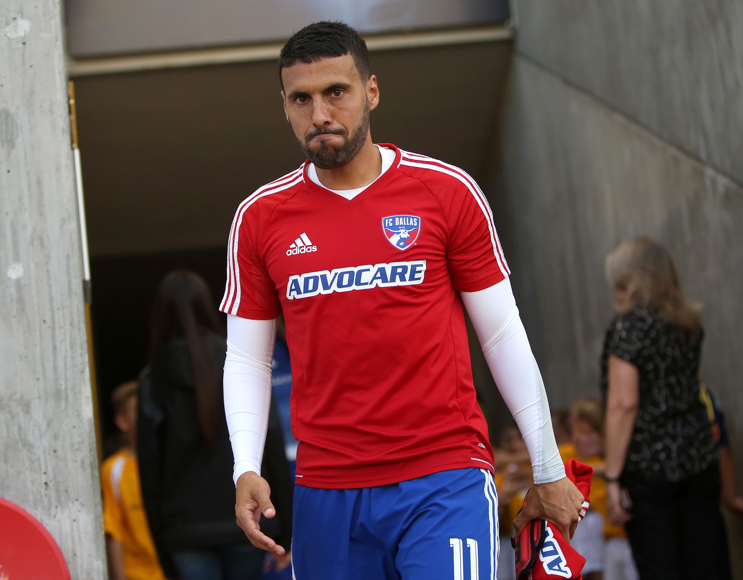Javier Morales hugs former teammate Bofo Saucedo as Real Salt Lake hosts FC Dallas at Rio Tinto Stadium. (Photo: Kristin Murphy, Deseret News)