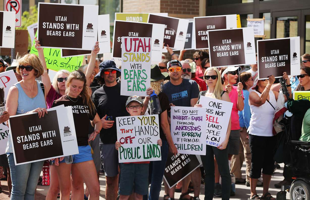Demonstrators rally outside the BLM offices as Sen. Orrin Hatch, R-Utah, meets with Secretary of the Interior Ryan Zinke during a listening tour of Utah monuments in Salt Lake City on Sunday, May 7, 2017. (Photo: Jeffrey D. Allred, Deseret News)
