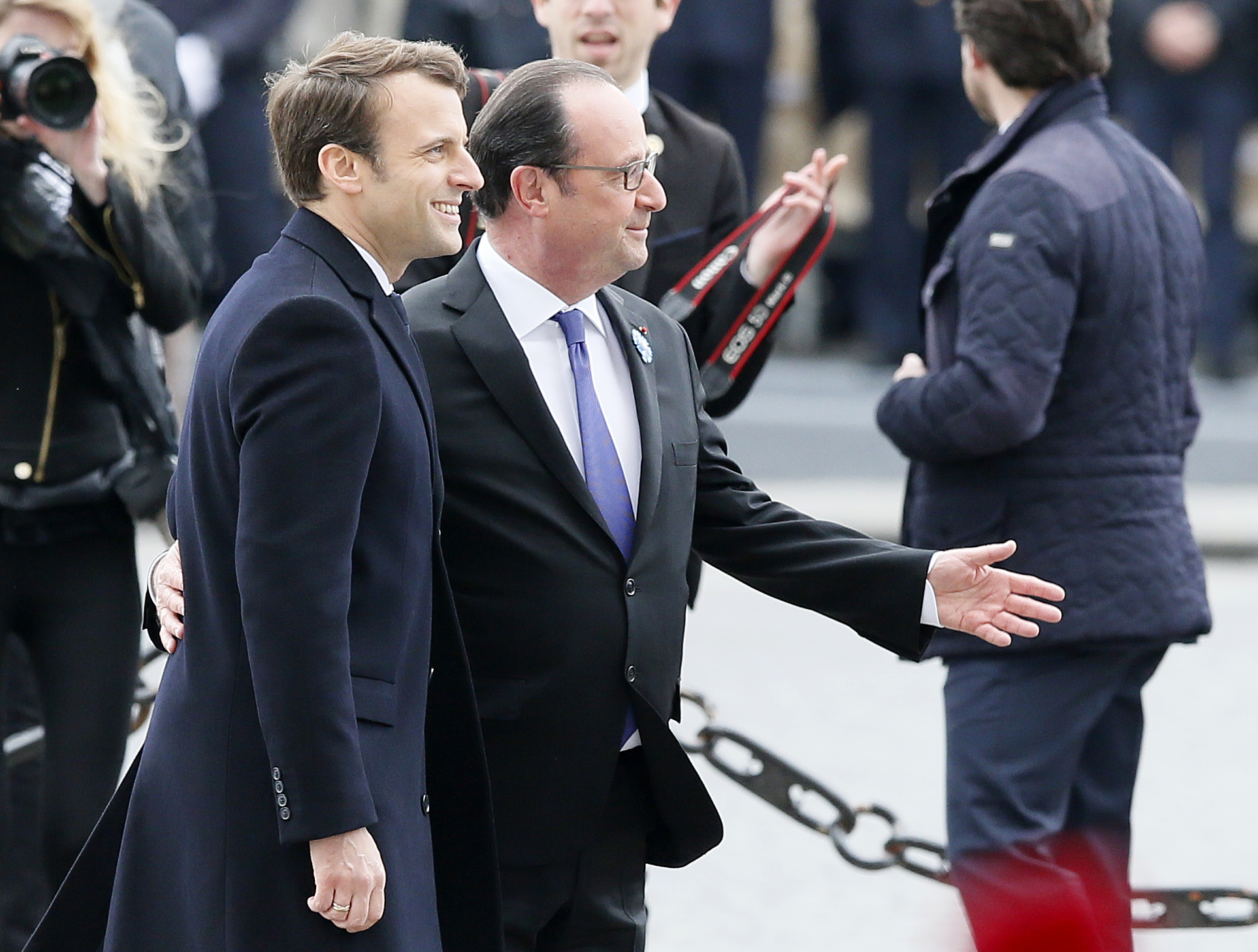 France's new head of state works on being presidential