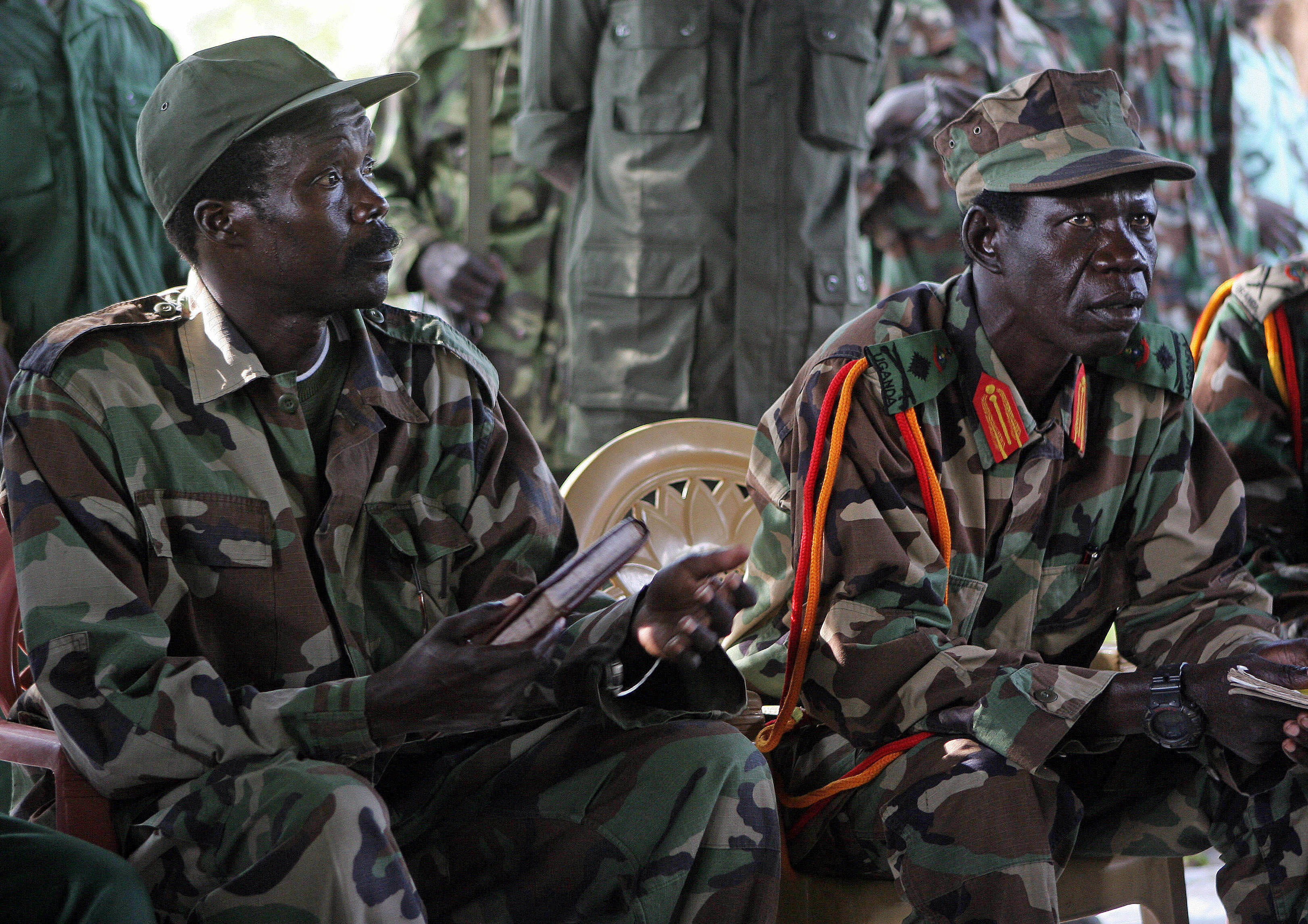 In this Nov. 12, 2006 file photo the leader of the Lord's Resistance Army, Joseph Kony, left, and his deputy Vincent Otti sit inside a tent at Ri-Kwangba in Southern Sudan. Photo: AP Photo