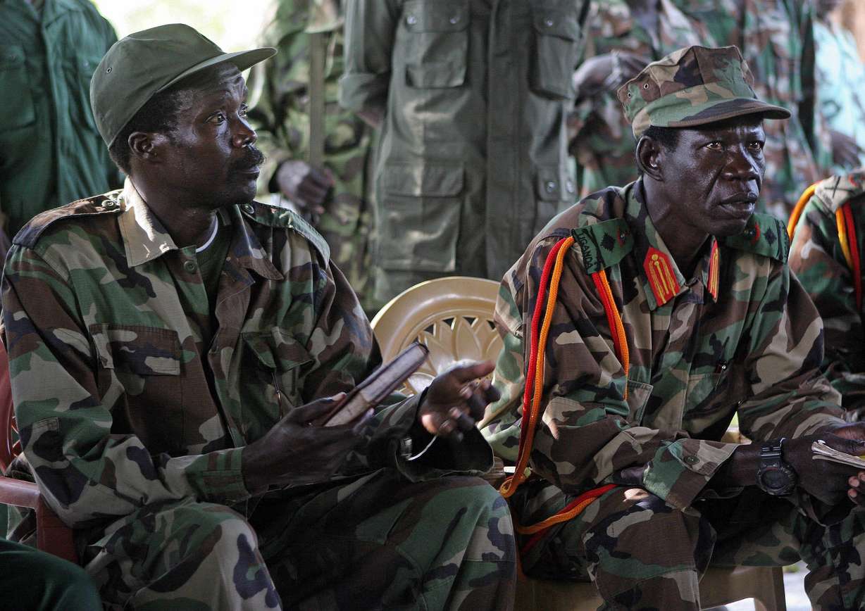 In this Nov. 12, 2006 file photo the leader of the Lord's Resistance Army, Joseph Kony, left, and his deputy Vincent Otti sit inside a tent at Ri-Kwangba in Southern Sudan. Photo: AP Photo
