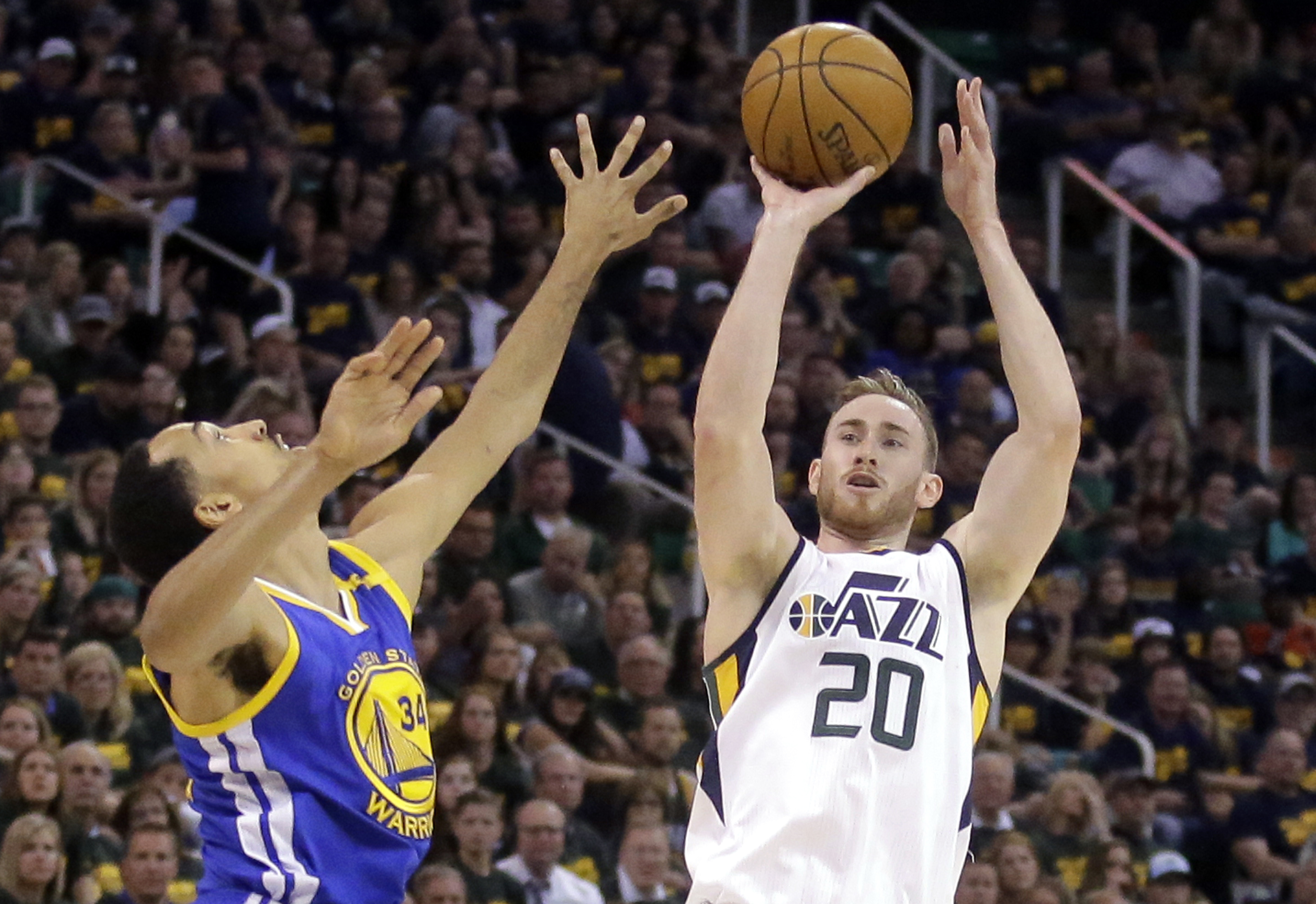 Utah Jazz forward Gordon Hayward (20) shoots as Golden State Warriors guard Shaun Livingston (34) defends in the second half during Game 3 of the NBA basketball second-round playoff series, Saturday, May 6, 2017, in Salt Lake City. Warriors won 102 - 91. (Rick Bowmer, AP Photo)