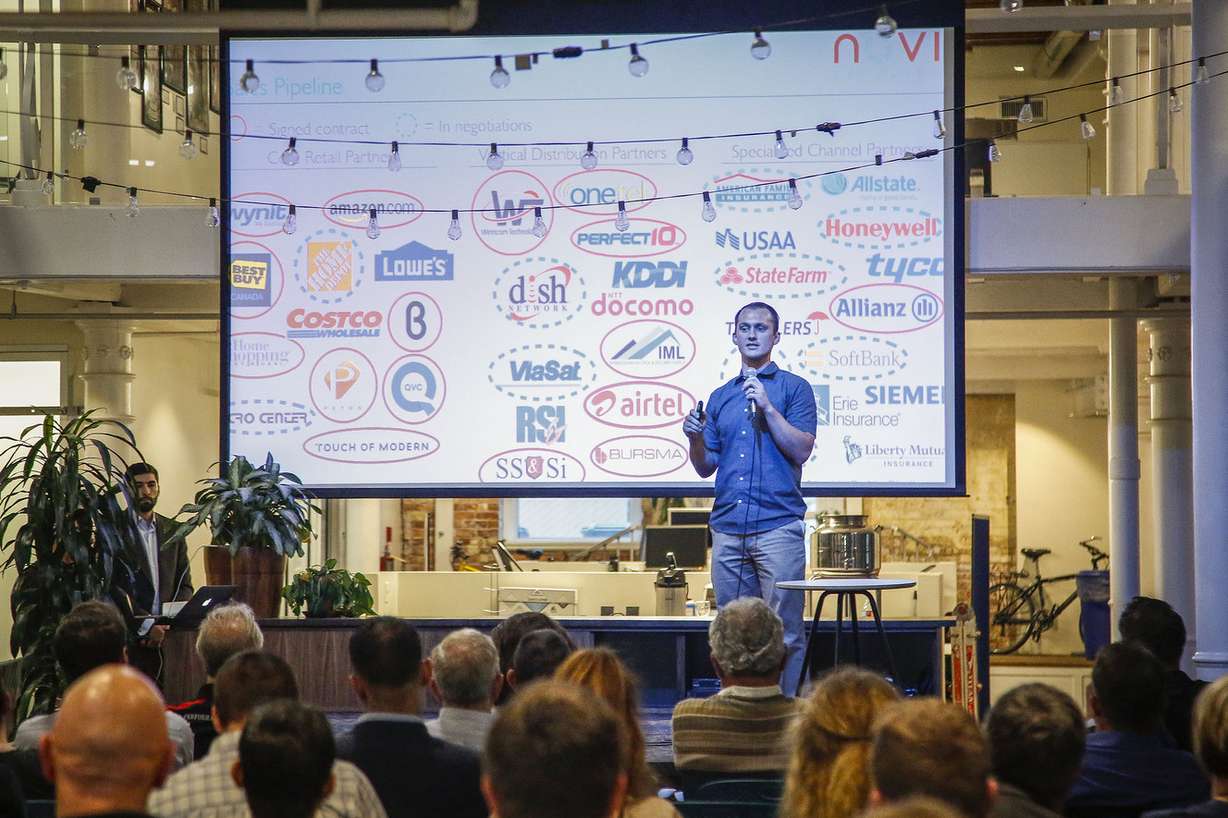 A member of the Novi Security team speaks during a five minute presentation during the Technology Commercialization and Innovation Demo Day event. Photo: Nicole Boliaux, Deseret News