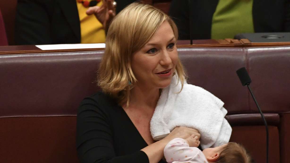 Australian senator breastfeeds baby on floor of Parliament