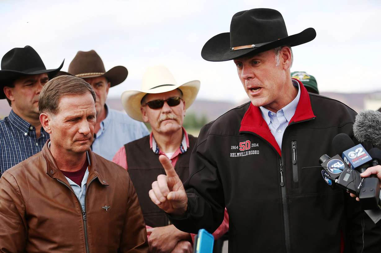 Interior Secretary Ryan Zinke, with Rep. Chris Stewart, R-Utah, at his side, talks with the media after a trip into the Grand Staircase-Escalante National Monument near Kanab on Wednesday. (Photo: Scott G Winterton, Deseret News)