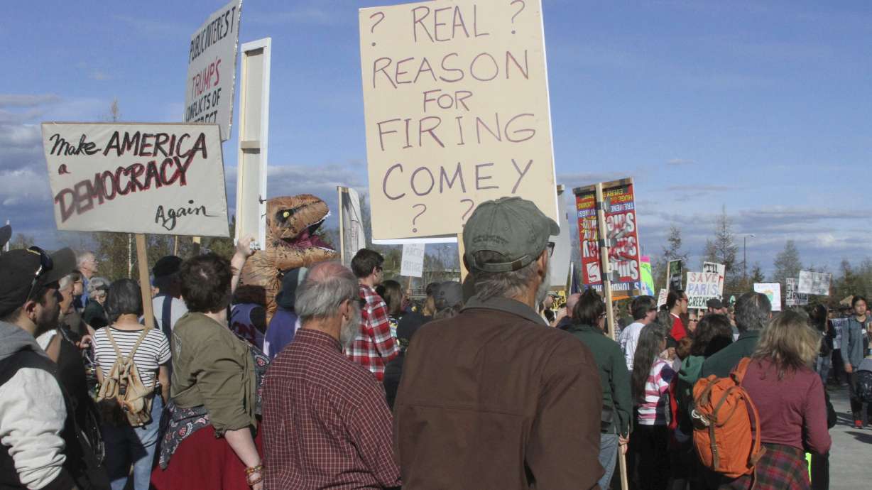 The Latest: Tillerson: US reviewing climate change policy