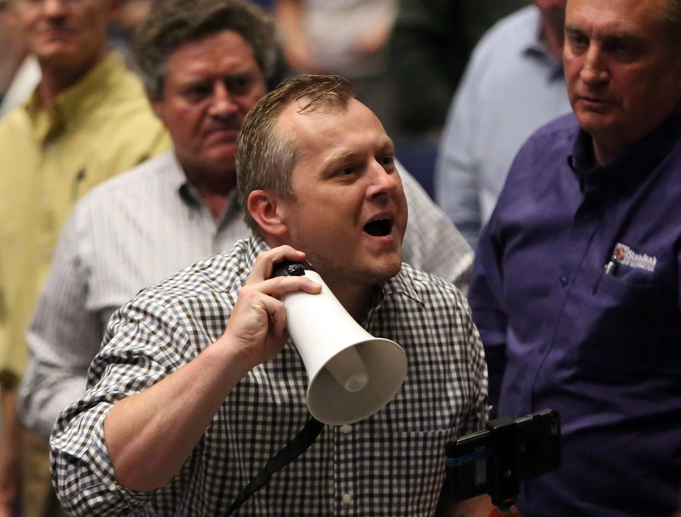 Brett Menzie of St. George, yells for Rep. Chris Stewart, R-Utah, to answer the rest of the questions, saying that it is his meeting too, during a town hall meeting at Richfield High School in Richfield on Friday. (Photo: Kristin Murphy, Deseret News)
