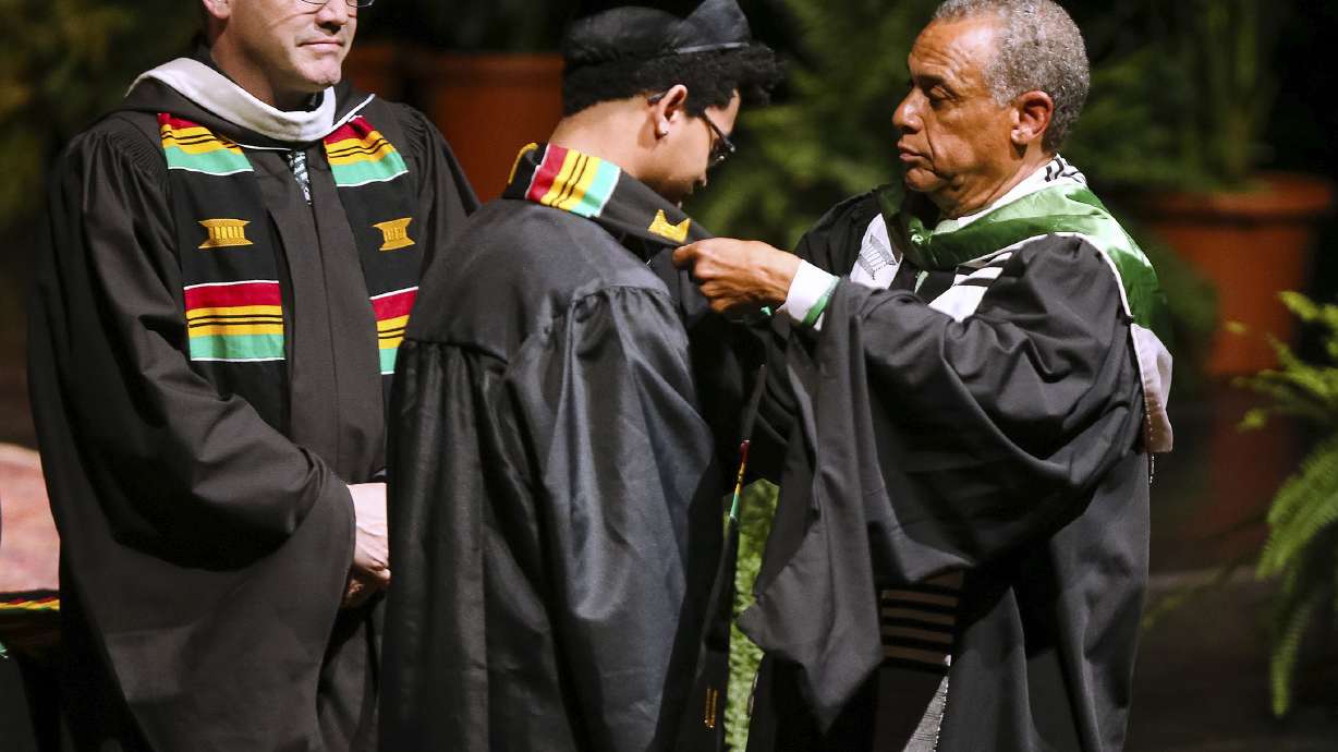 Black Harvard students holding a graduation of their own