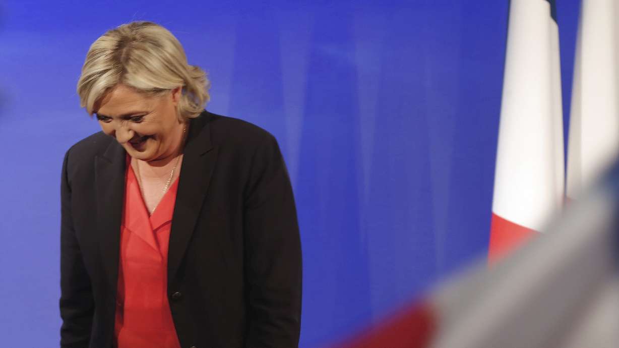 France's Le Pen to run for parliament with party in disarray