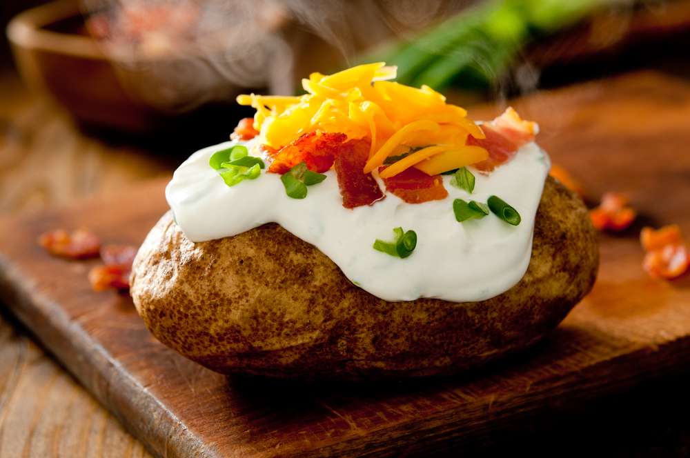 Potatoes offer many nutrients and minerals, but can become unhealthy if fried or loaded with butter, sour cream and cheese. (Photo: )