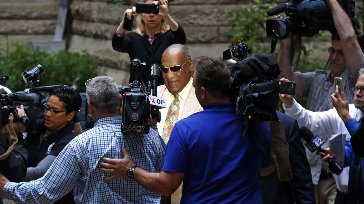 The Latest: 3 white men, 2 white woman seated for Cosby jury