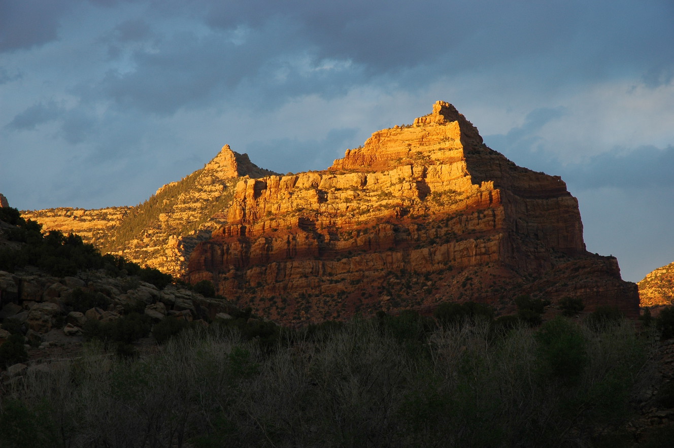 The last light of day spotlights a colorful peak above the Wilcox Ranch in the Book Cliffs' Range Creek in a 2004.