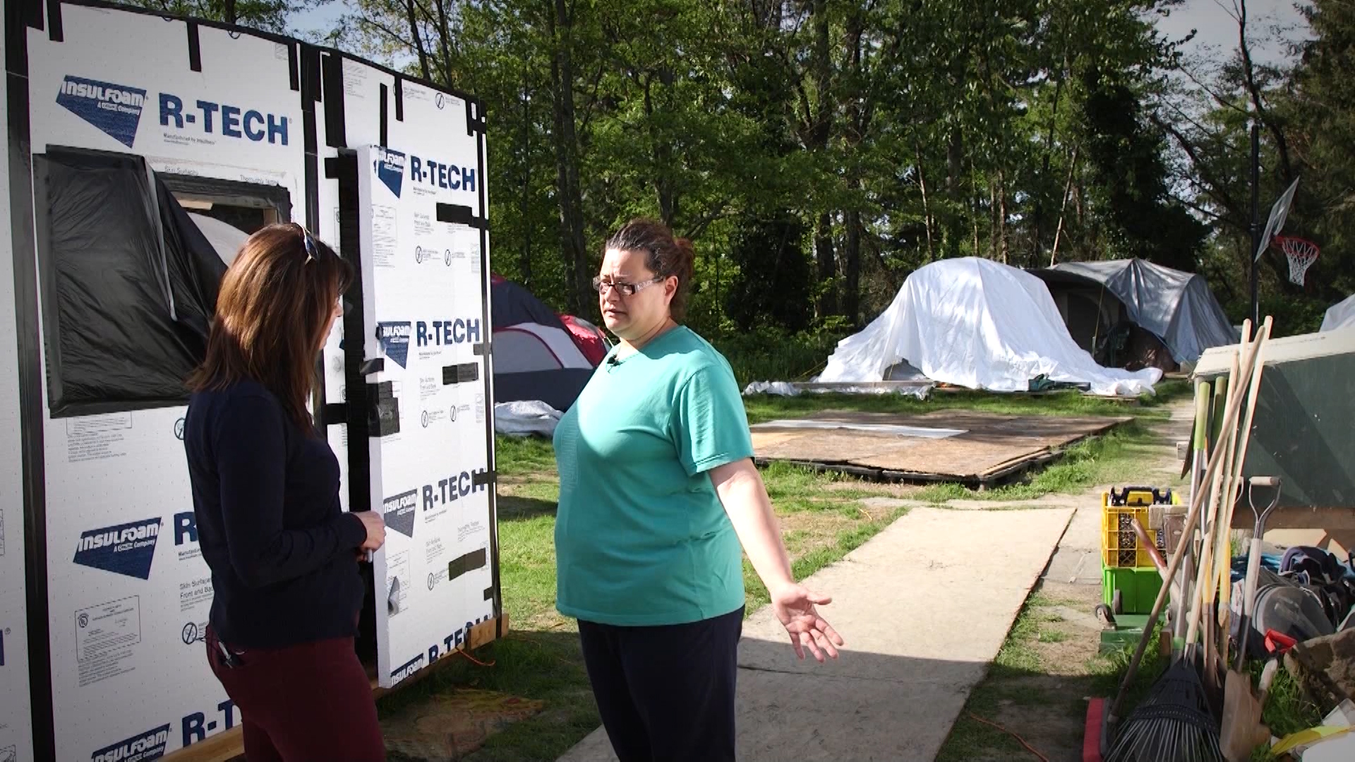 Alycia Roberts, a resident of Camp United We Stand, gives KSL's Debbie Dujanovic a tour of the Seattle camp for the homeless. (Photo: KSL TV)