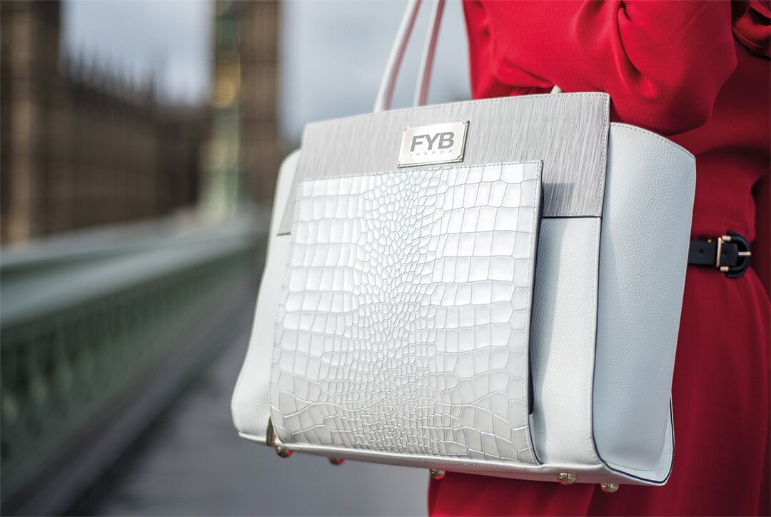 Utah woman creates smart purse with phone charger, Bluetooth connectivity