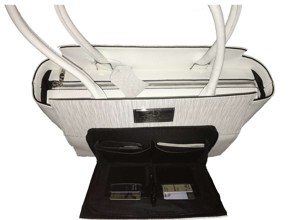 Utah woman creates smart purse with phone charger, Bluetooth connectivity