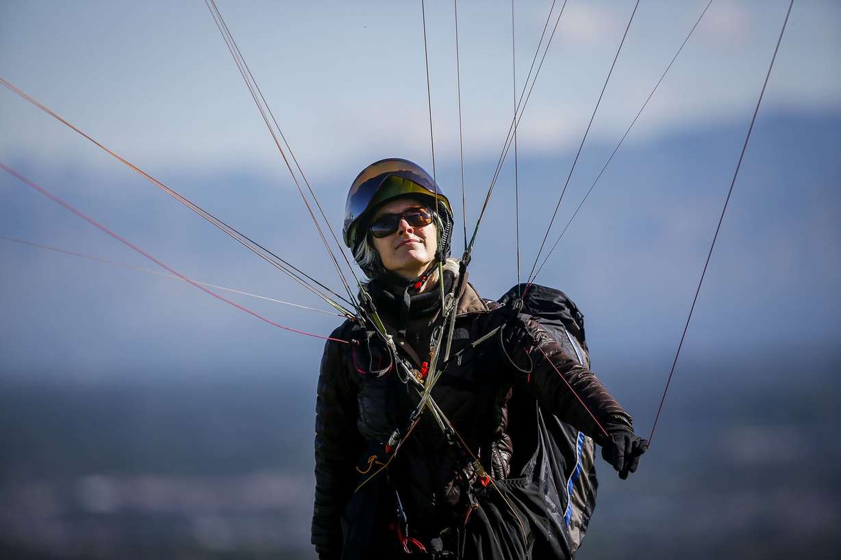 CJ Brockway, from Seattle, kites her parachute during a gathering for women from around the United States at the Point of the Mountain in Draper on Saturday, May 27, 2017. The group hopes to set a Guinness world record of the most women kiting consecutively on Sunday. (Photo: Nicole Boliaux, Deseret News)