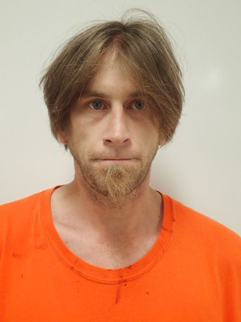 Police: Man yelled racial slurs before machete attack