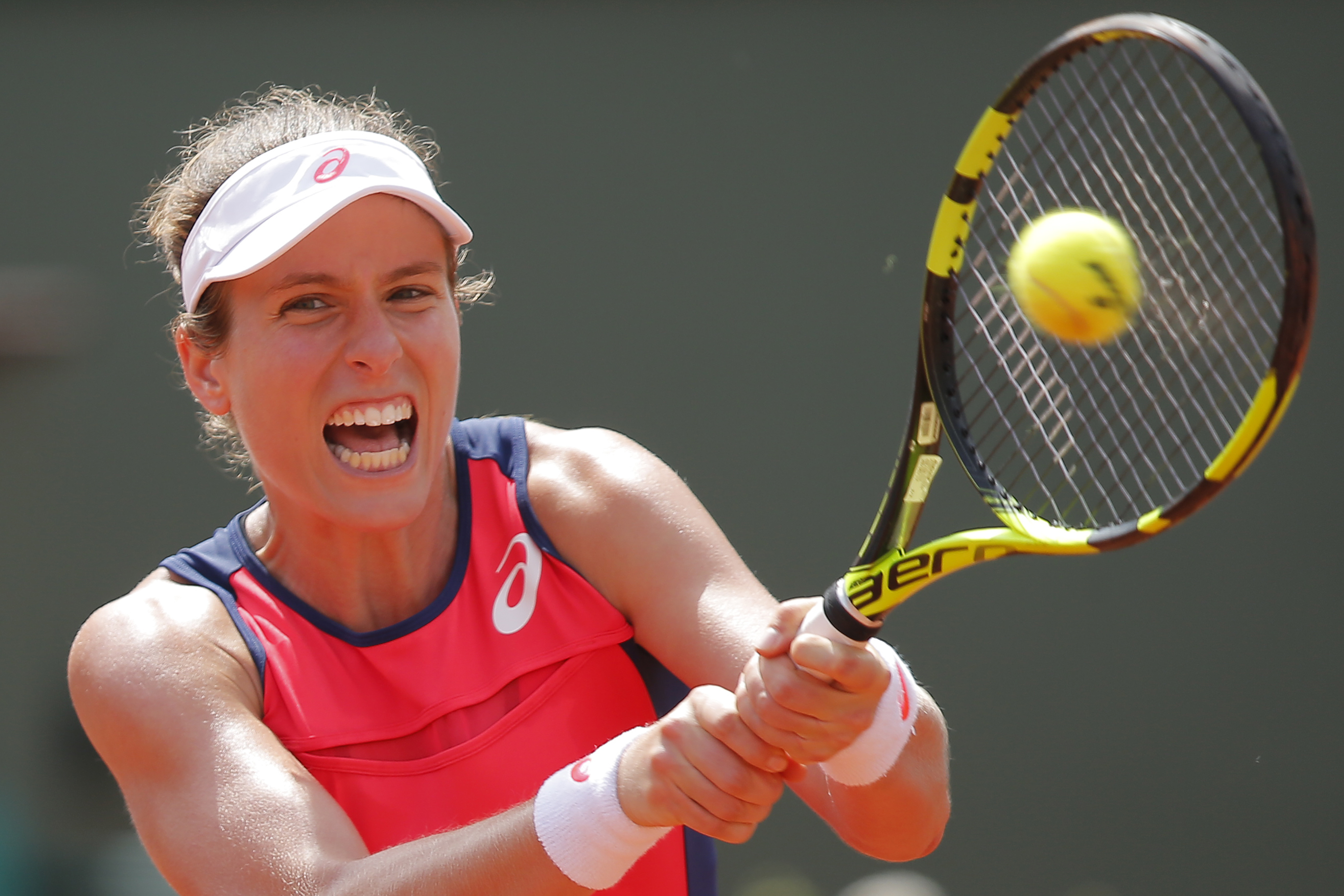 The Latest: Tsonga on brink of early French Open exit