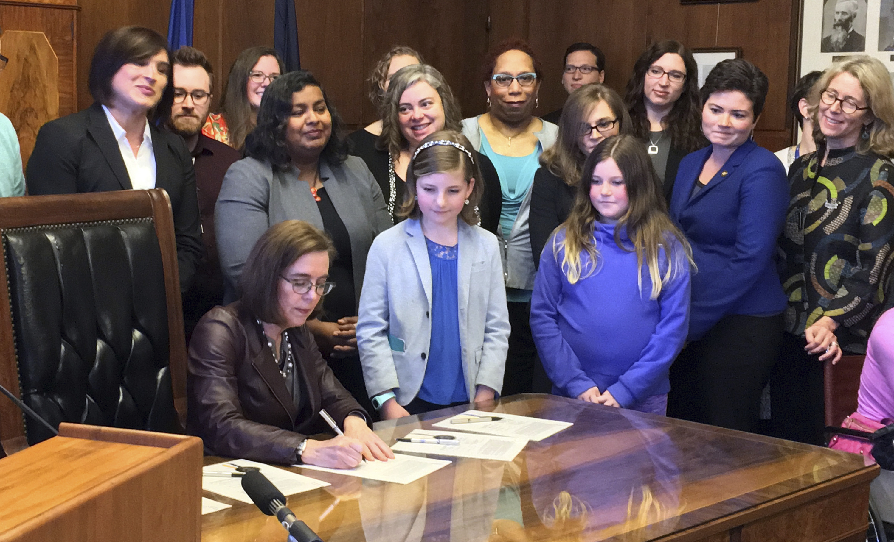 Oregon governor signs transgender equity bill into law