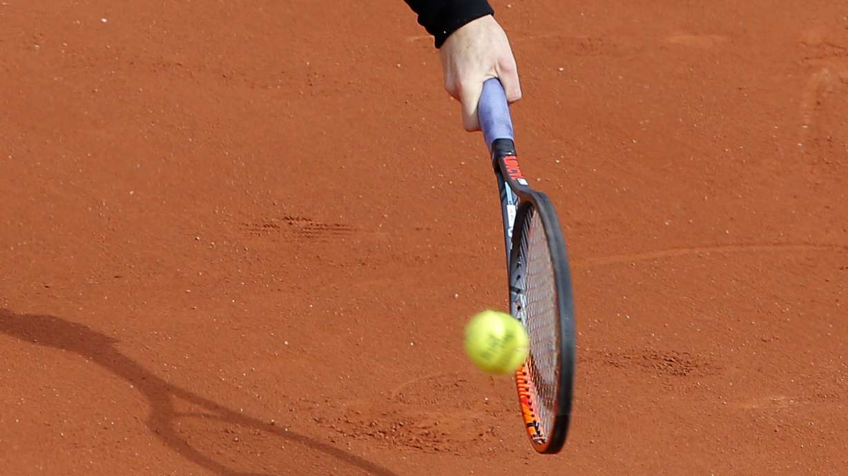 The Latest: No. 12 Keys loses to 290th-ranked qualifier