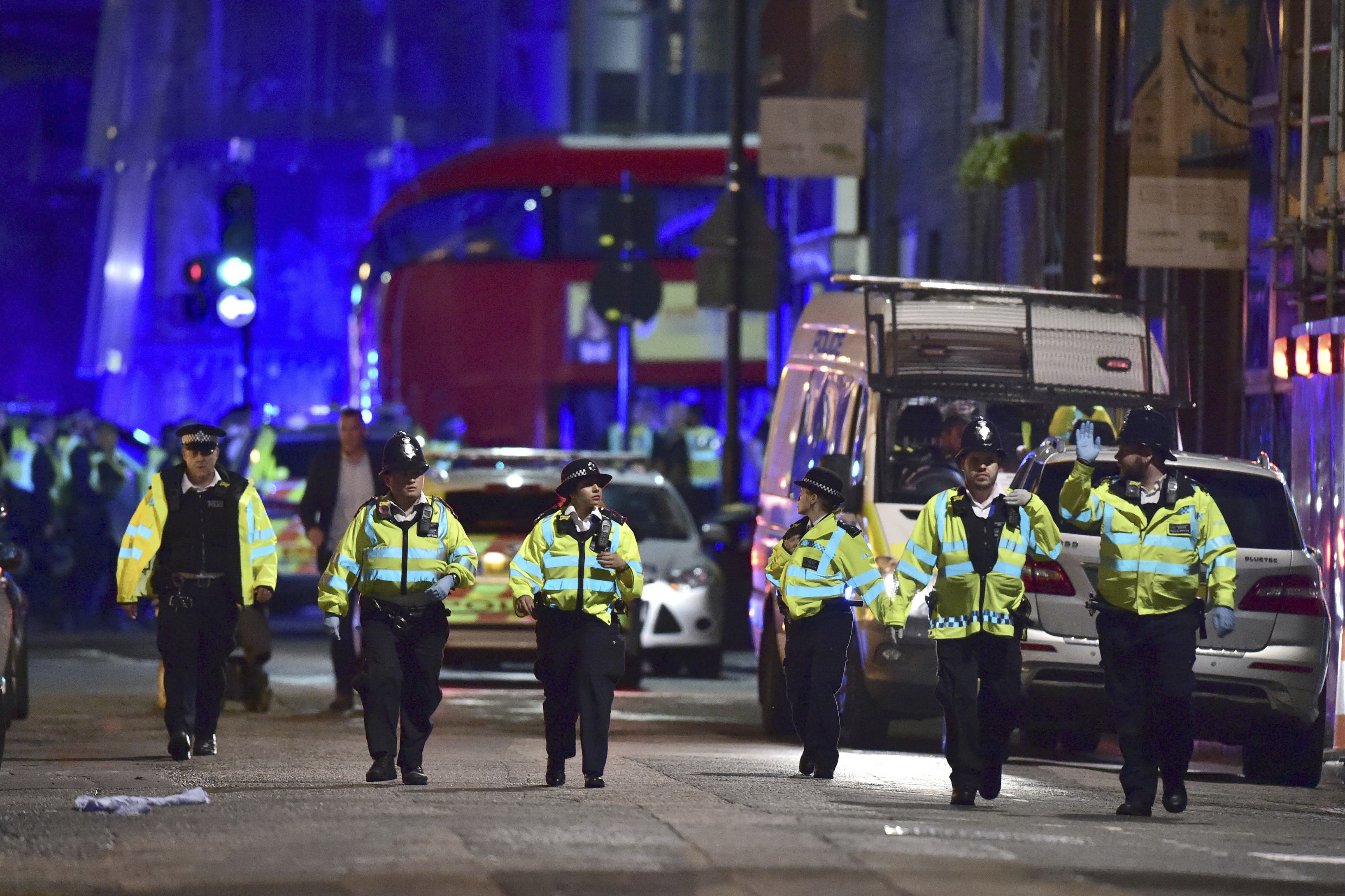 Police officers on Borough High Street as police are dealing with an incident on London Bridge in London, Saturday, June 3, 2017. Witnesses reported a vehicle hitting pedestrians and injured people on the ground. (Dominic Lipinski, AP Photo)