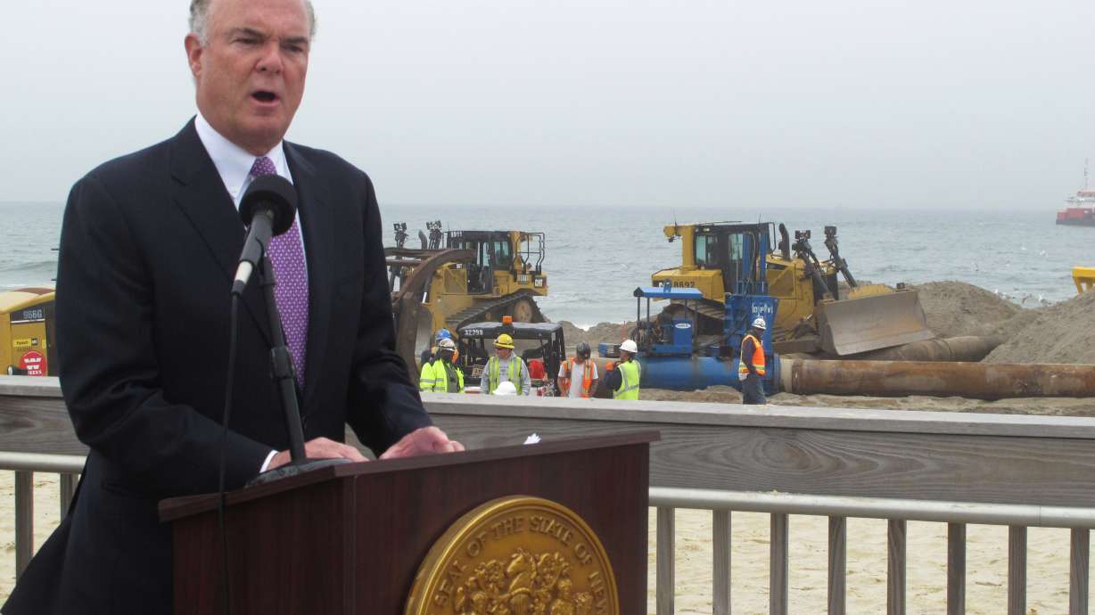 Help arrives for Sandy-wrecked town as others resist dunes