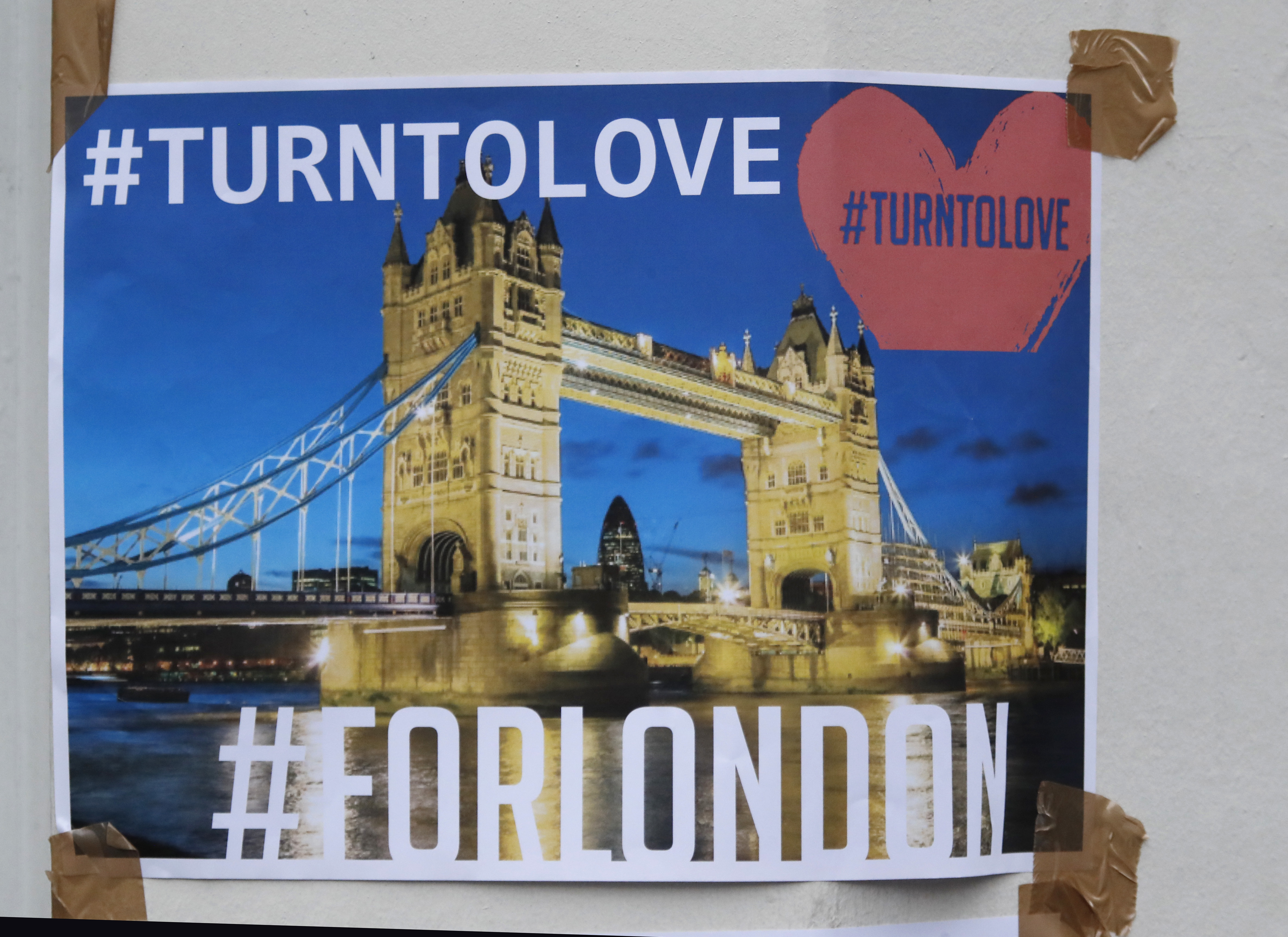 UK hails man who fled attack holding beer an unlikely hero